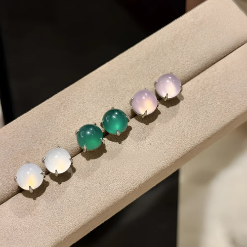 Chinese style chalcedony earrings with four claw copper setting and round egg surface stone