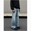 Men's blue straight leg jeans with whisker wash detailing and visible stitching on medium-high waist