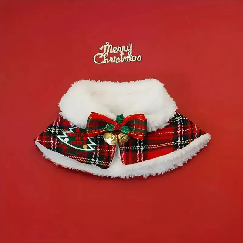 Red pet Christmas scarf with a jingle bell on a dog, showing the polyester fabric and festive design.