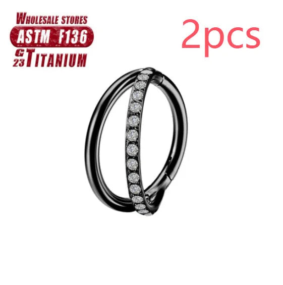 Titanium alloy fork nose ring in silver colour on a plain background, showing its shape and size.
