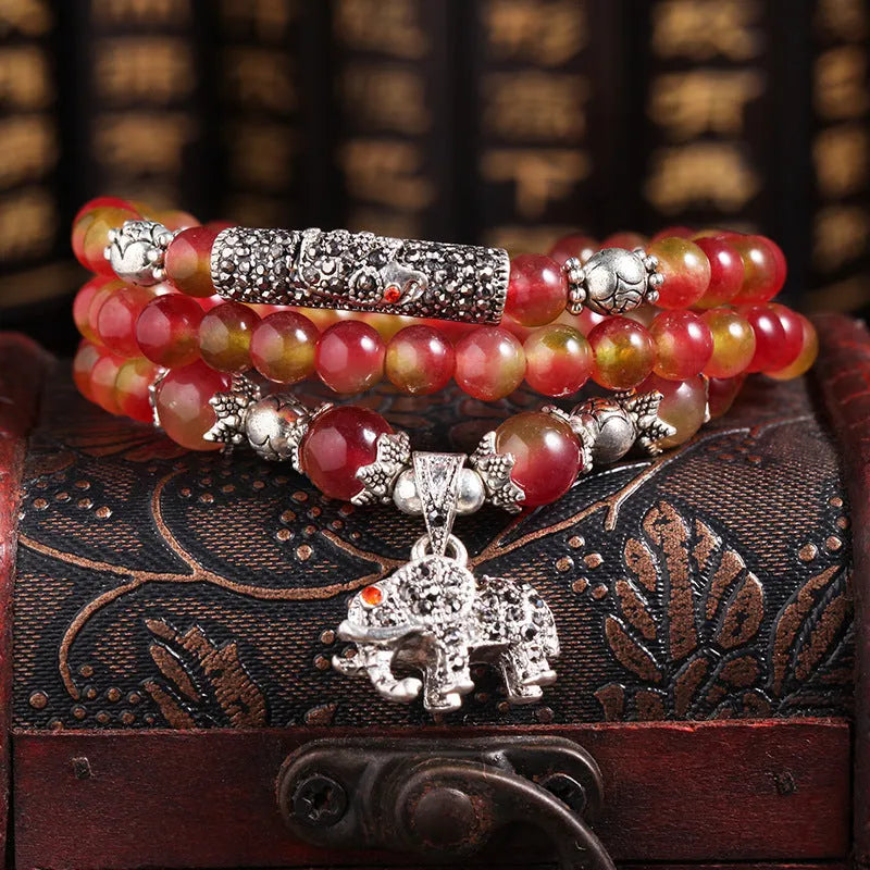 Watermelon crystal bracelet with Chinese knot detailing in geometric national style design