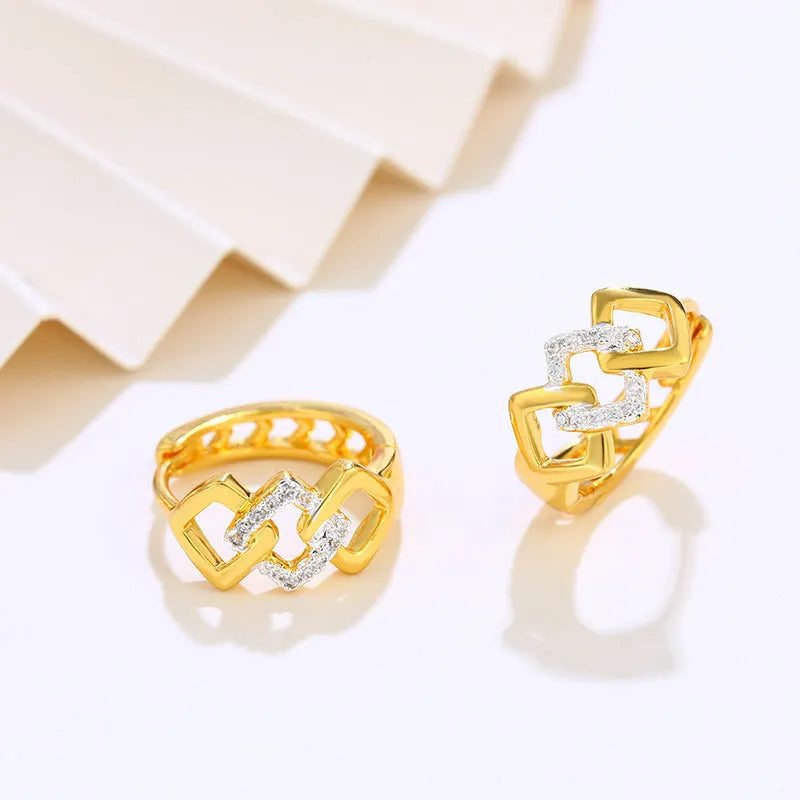 Gold geometric hollow-out clip earrings with colour separation design on alloy metal