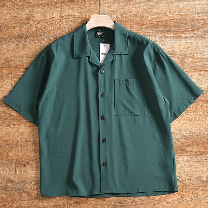 Men's loose-fit lightweight short sleeve shirt in solid colour, shown in Army Green.