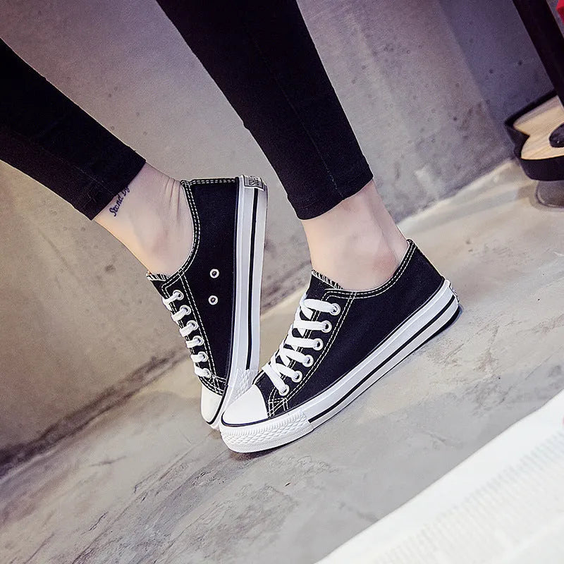 Women's solid colour casual canvas shoe on a white background.