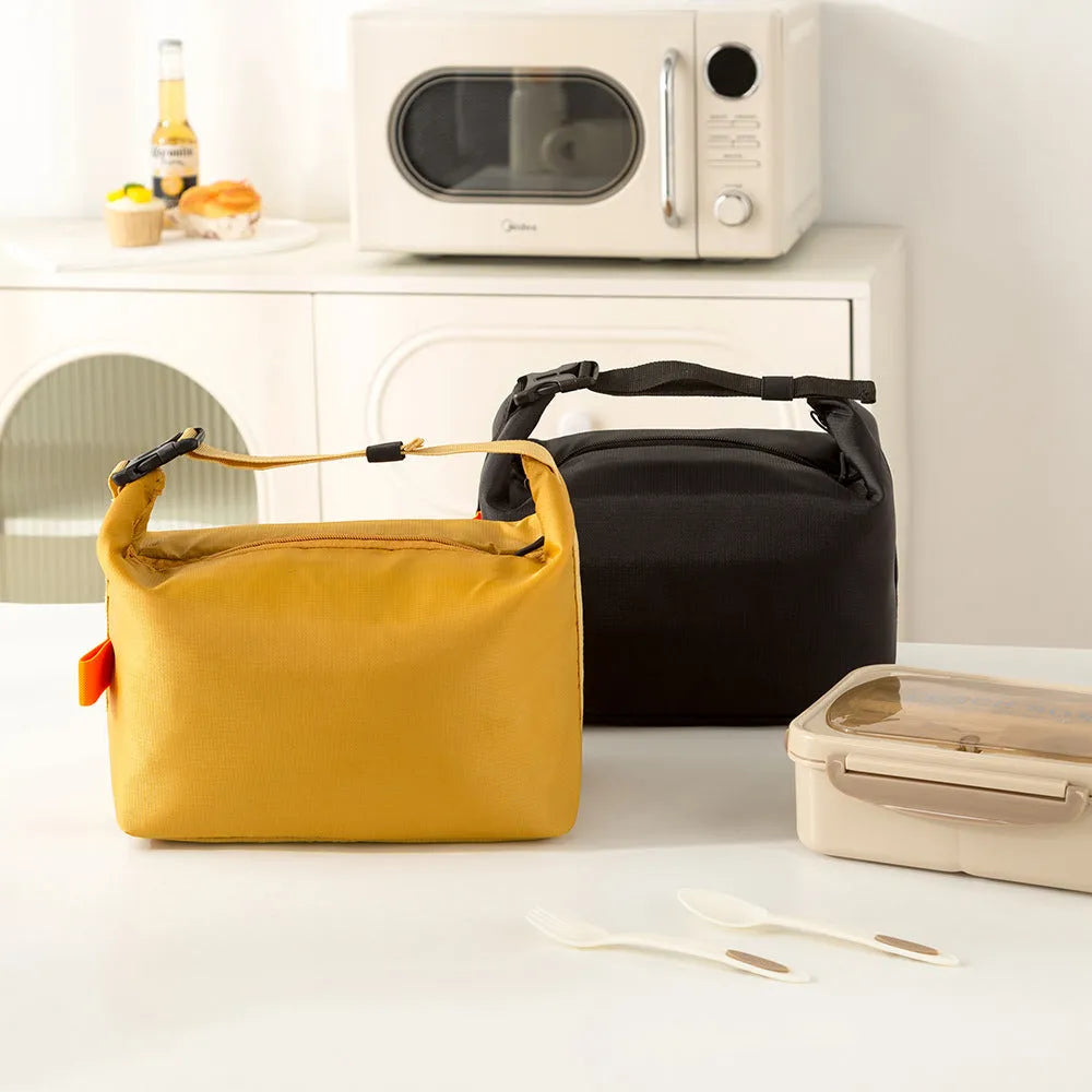 Japanese style insulated storage bag in Oxford cloth with wide opening for food items
