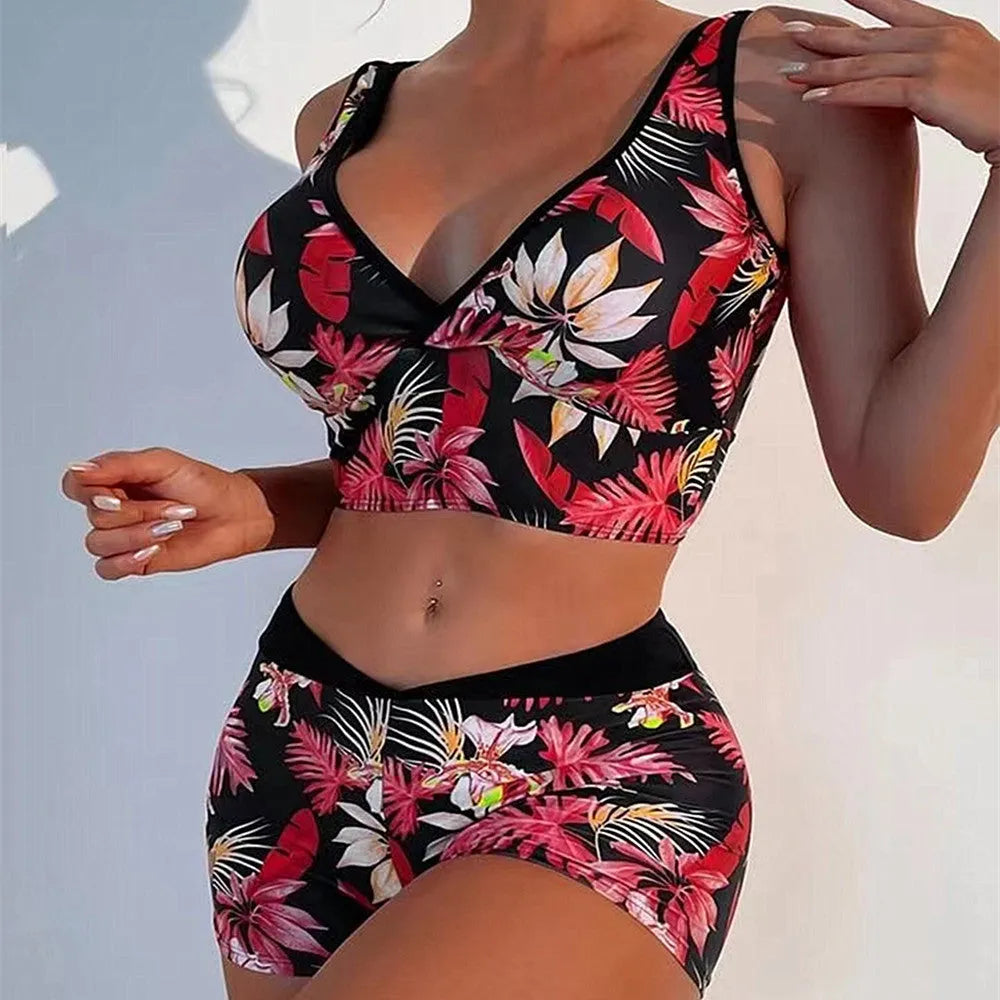 Women's two-piece printed swimsuit set showing sleeveless top and briefs-style bottom in one of seven colour patterns