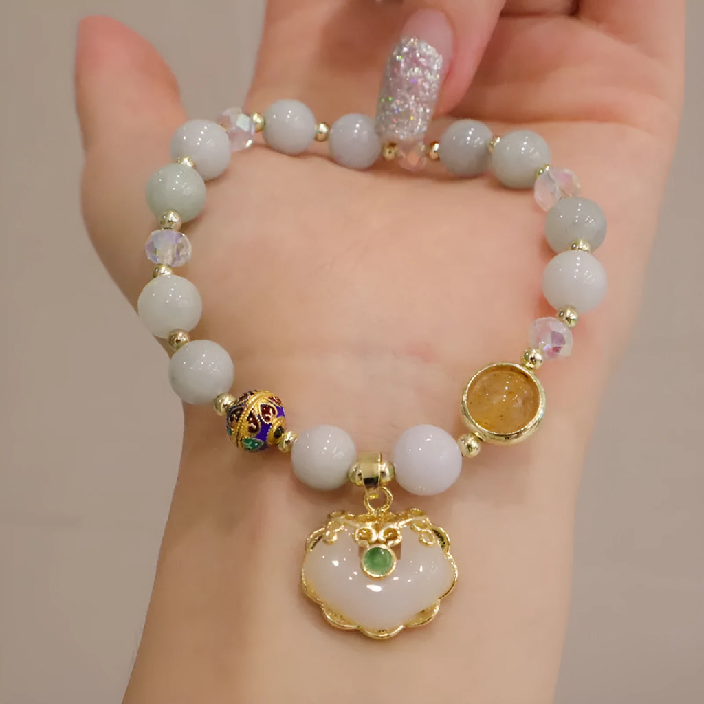 Geometric ethnic style jade bracelet with three-dimensional metal decorations in grey jade or strawberry quartz