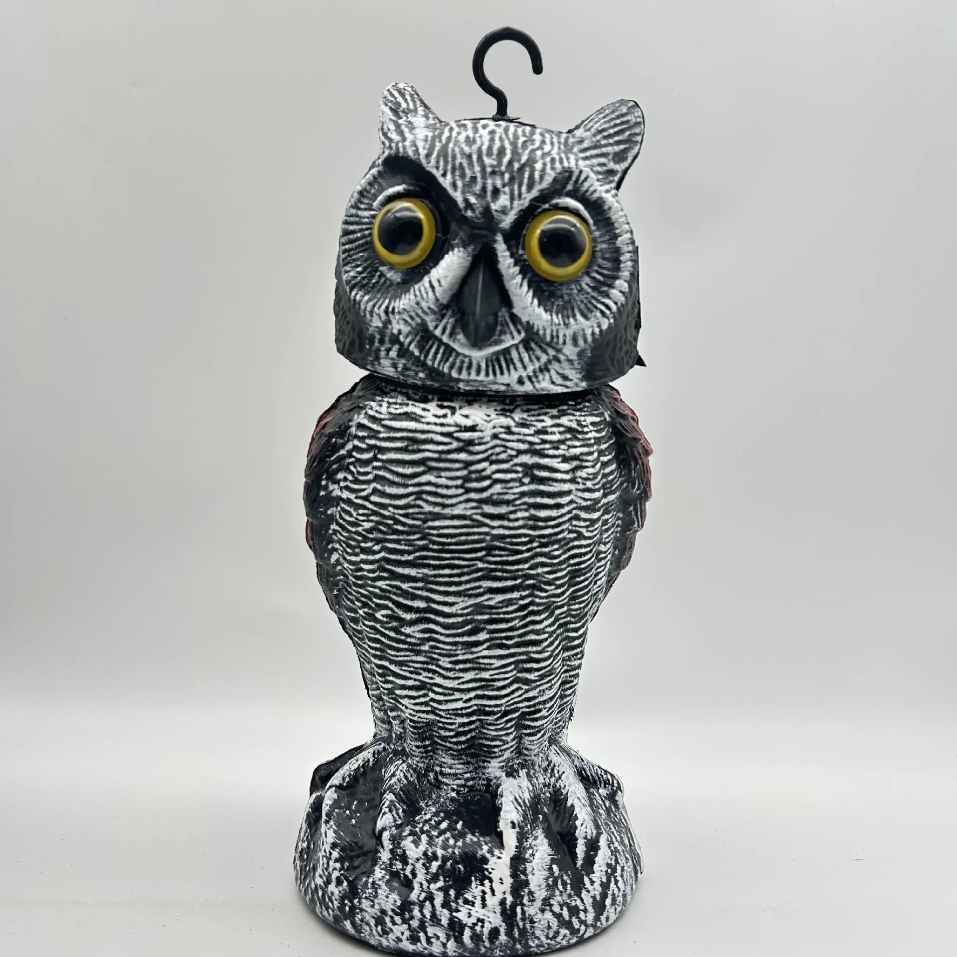 Artificial owl bird deterrent decoy with realistic features for outdoor garden use