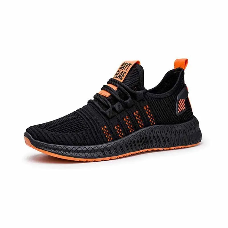 Men's black casual sports shoes with cross-strap detail and Flying Weave textured upper.