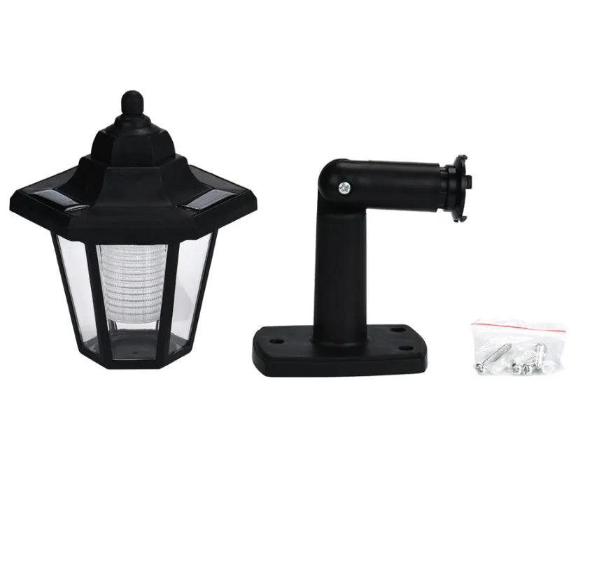 Black hexagonal solar wall lamp for outdoor garden and patio lighting