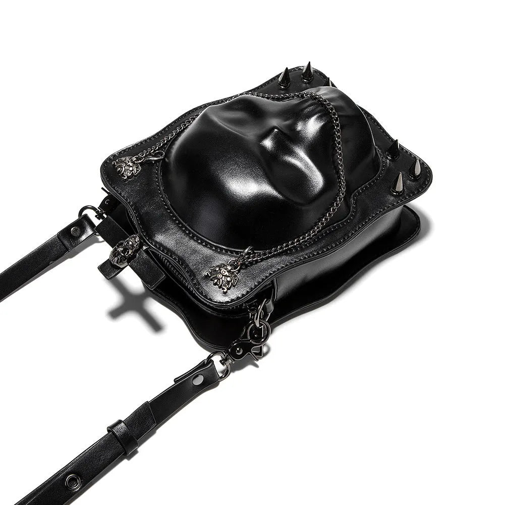 Black mini square crossbody bag with 3D embossed skull design and chain strap