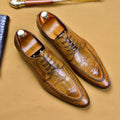 Men's brown leather loafers with a silver horse bit buckle on a rubber sole.