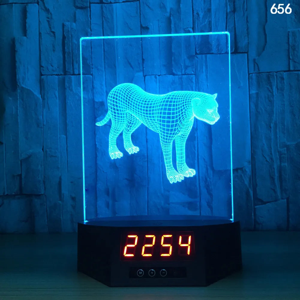 Glowing blue dolphin 3D night light with wireless charging base and remote control on wooden table