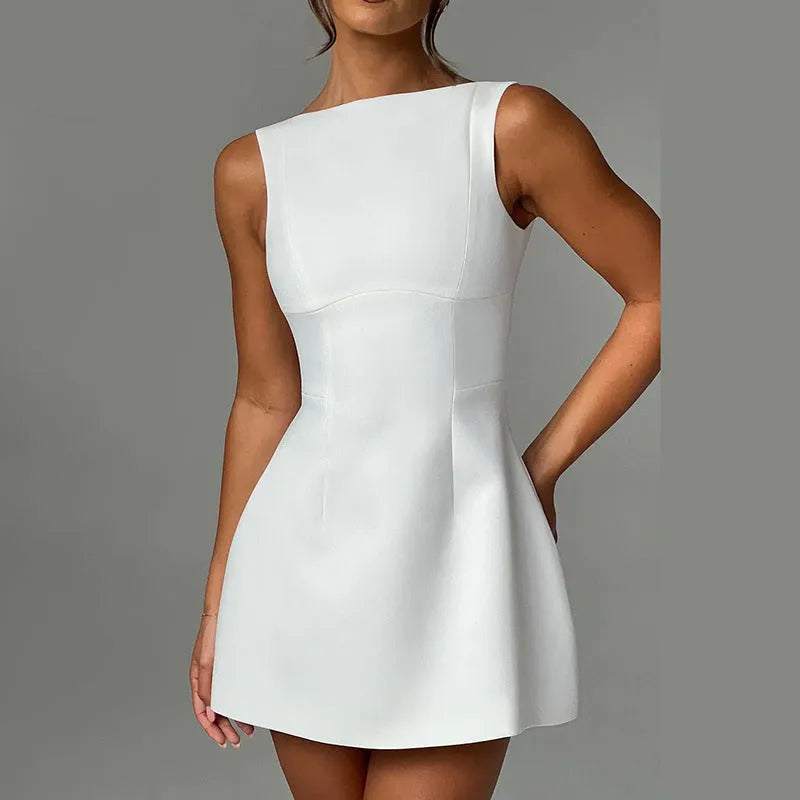 Backless slim-fitting sleeveless summer dress in polyester fabric on a hanger