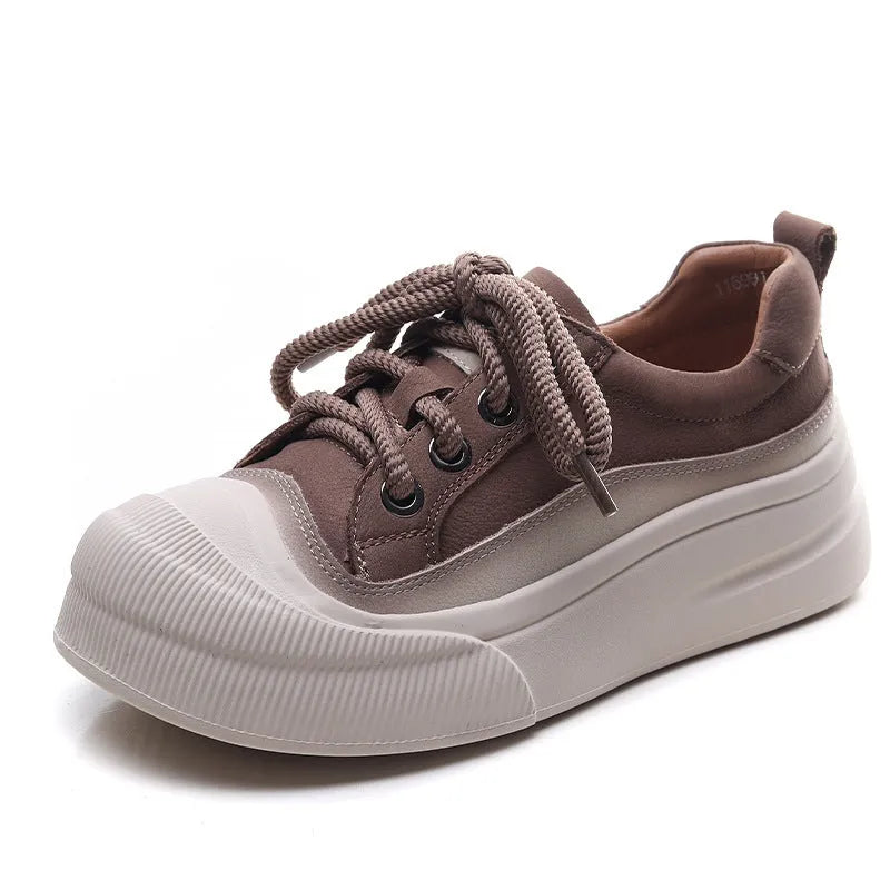 Women's yellow leather lace-up casual shoes with round toe and rubber sole.