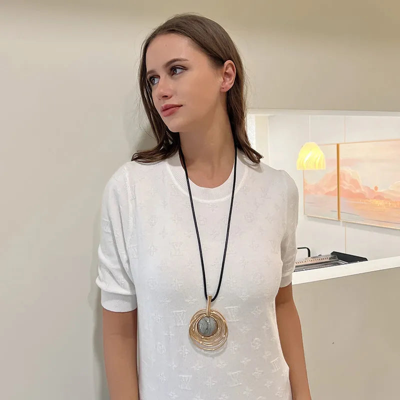 Geometric pendant necklace with snakeskin wax rope chain in gold colour, adjustable length 51-80cm