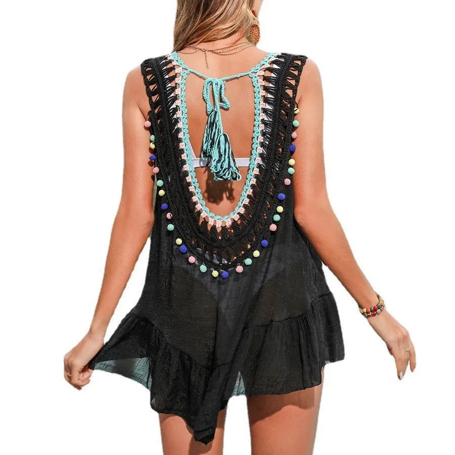 Black hand-crocheted women's beach cover-up with ruffled cut-out design and polyester lining