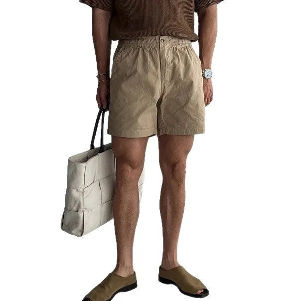 Cotton loose-fit sports shorts in black, white or khaki colour options