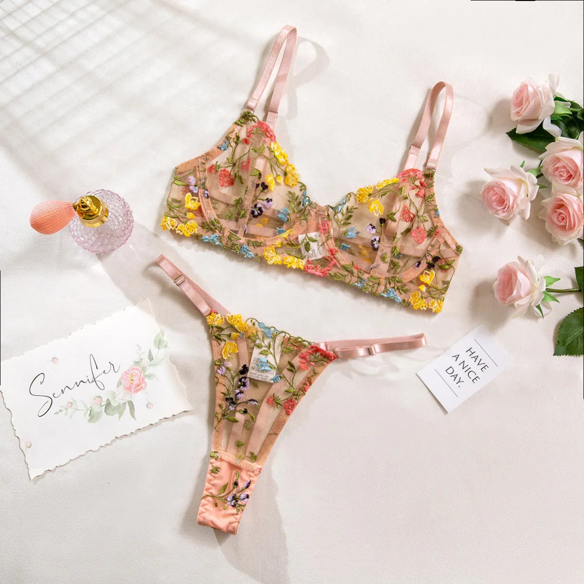 Floral bra set with steel ring T-back in polyester mesh fabric showing 3/4 moulded cup design