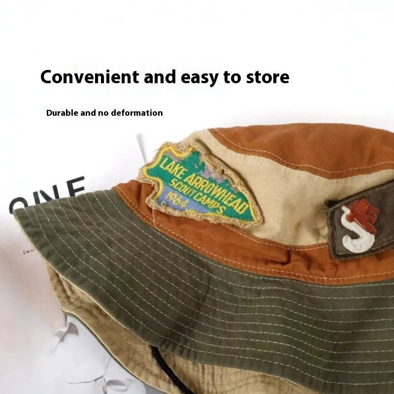 Army green cotton fisherman hat with patchwork detailing and flat top crown