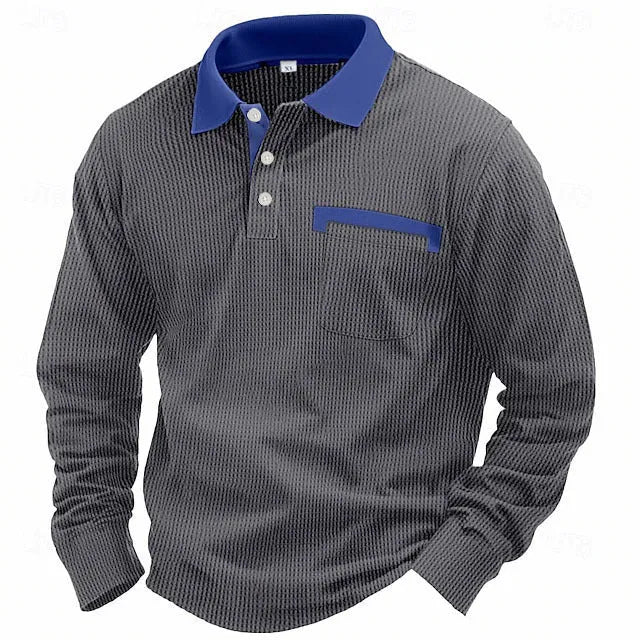 Man wearing a long-sleeved waffle-textured polo shirt in a loose fit with an asymmetric design detail.