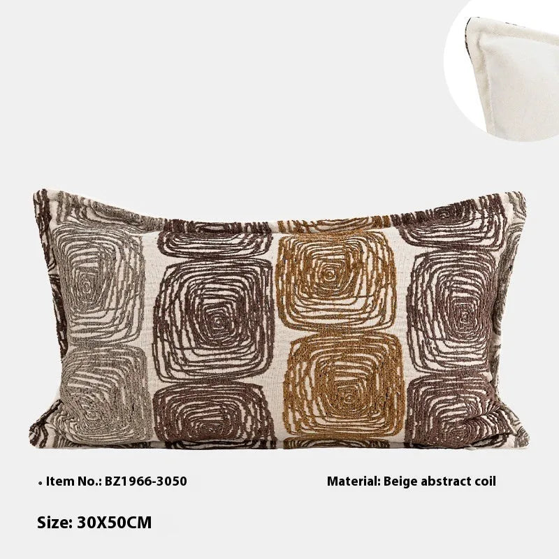 Cream and coffee-coloured abstract coil pattern on square and rectangular polyester pillow covers.