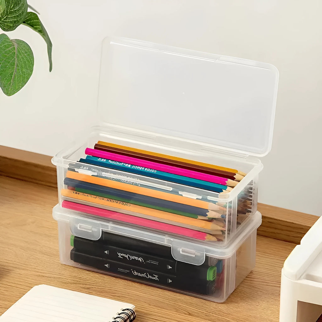 Clear transparent large pencil storage box filled with colouring pencils and crayons