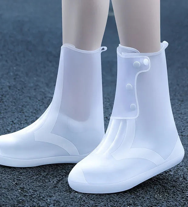 White PVC high top reusable waterproof shoe covers for women with anti-skid soles