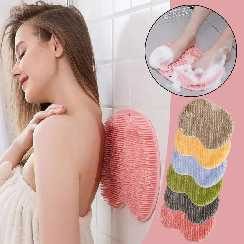 Orange silicone bristle bath brush with suction cups on base, size 23x30cm, for foot and back cleaning.