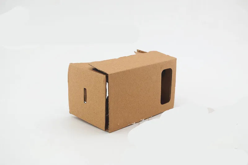 Pink cardboard VR glasses with rubber head strap and 3D lenses for smartphones