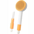Green 2-in-1 pet grooming brush with stainless steel teeth for cats and dogs measuring 17.5cm