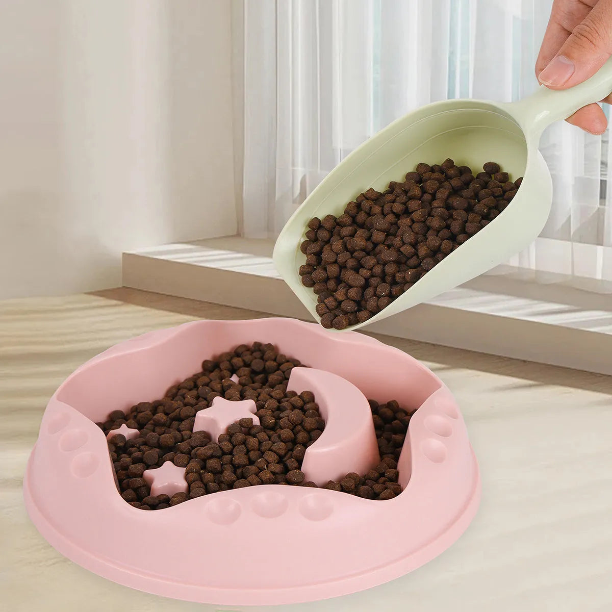 Moon Star Wings pattern slow feeder dog bowl in blue, grey, green, pink, or yellow with non-slip base