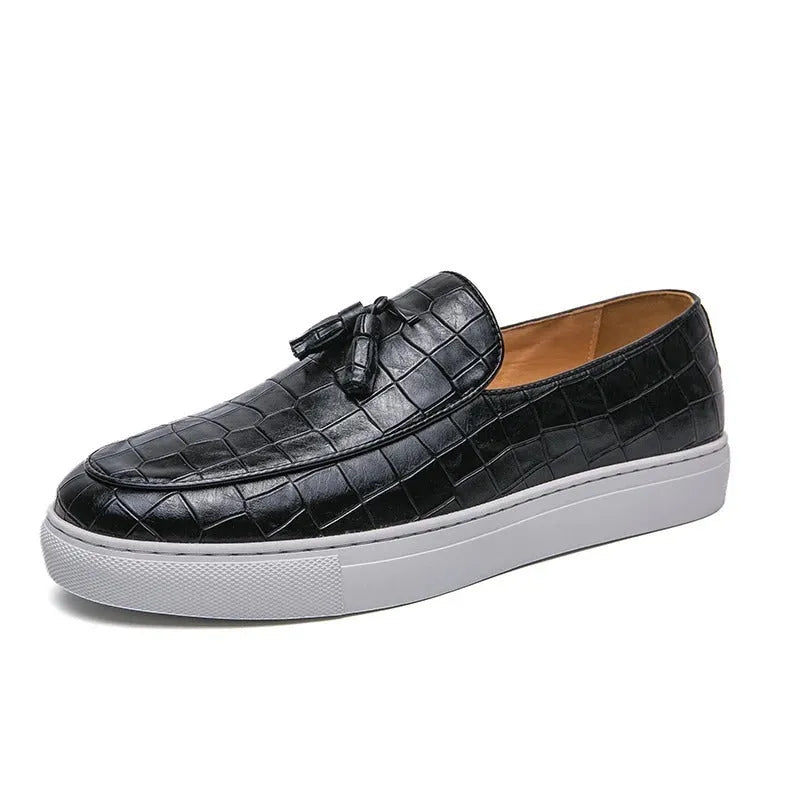 Men's black casual sneakers with a tassel detail on the artificial PU upper and a round toe.