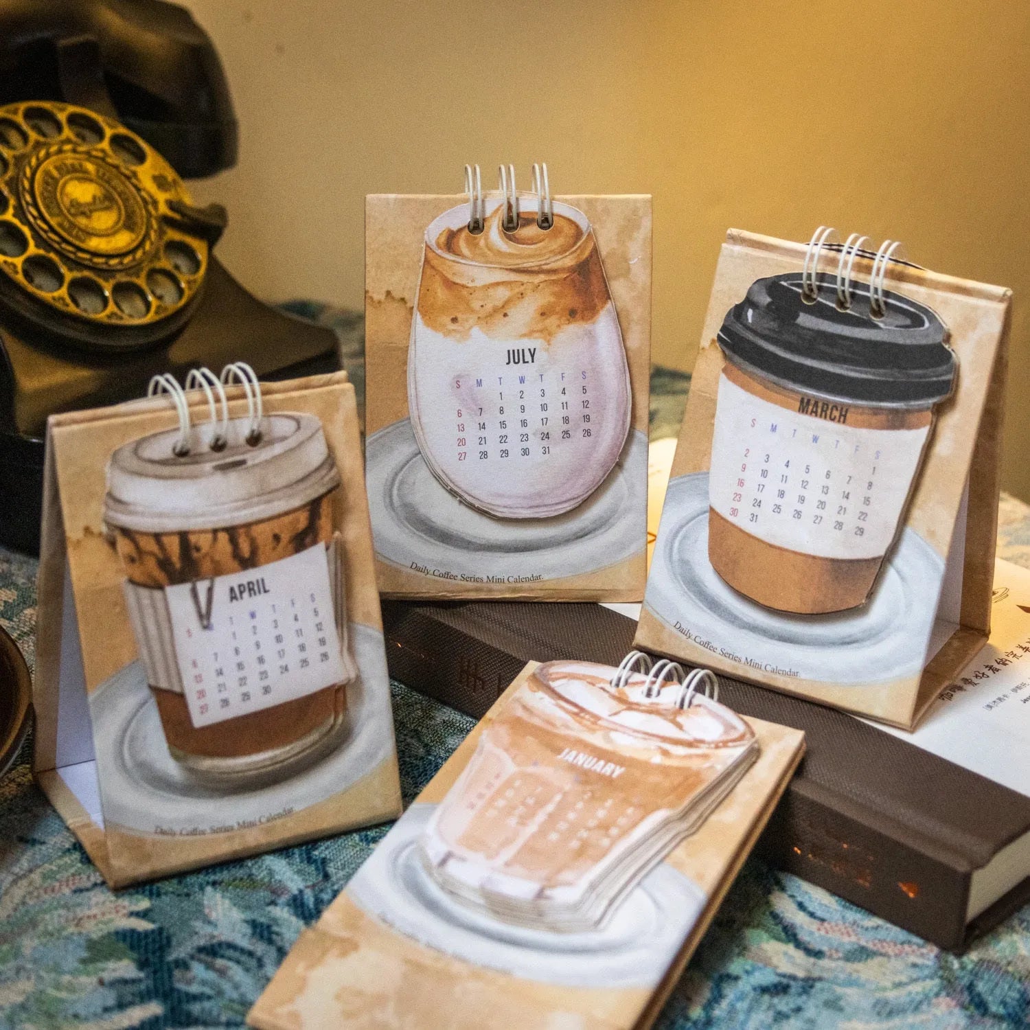 Mini coffee-themed desk calendar for 2025 showing daily pages and simple modern design