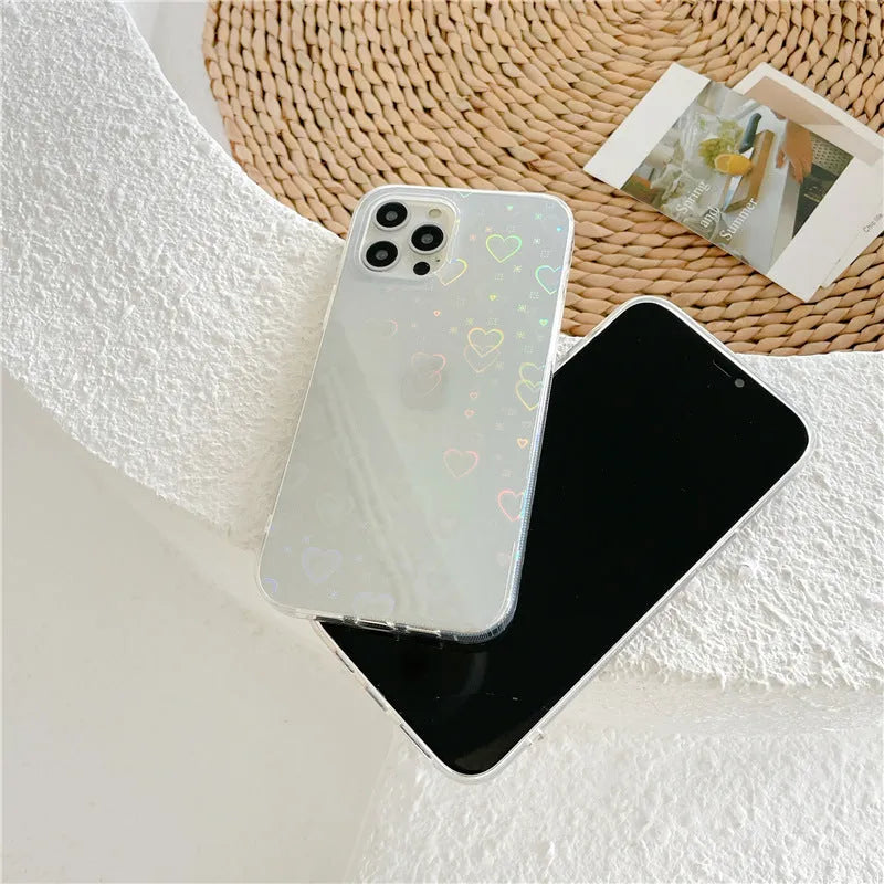 Transparent silicone iPhone case with a colourful laser love heart design.