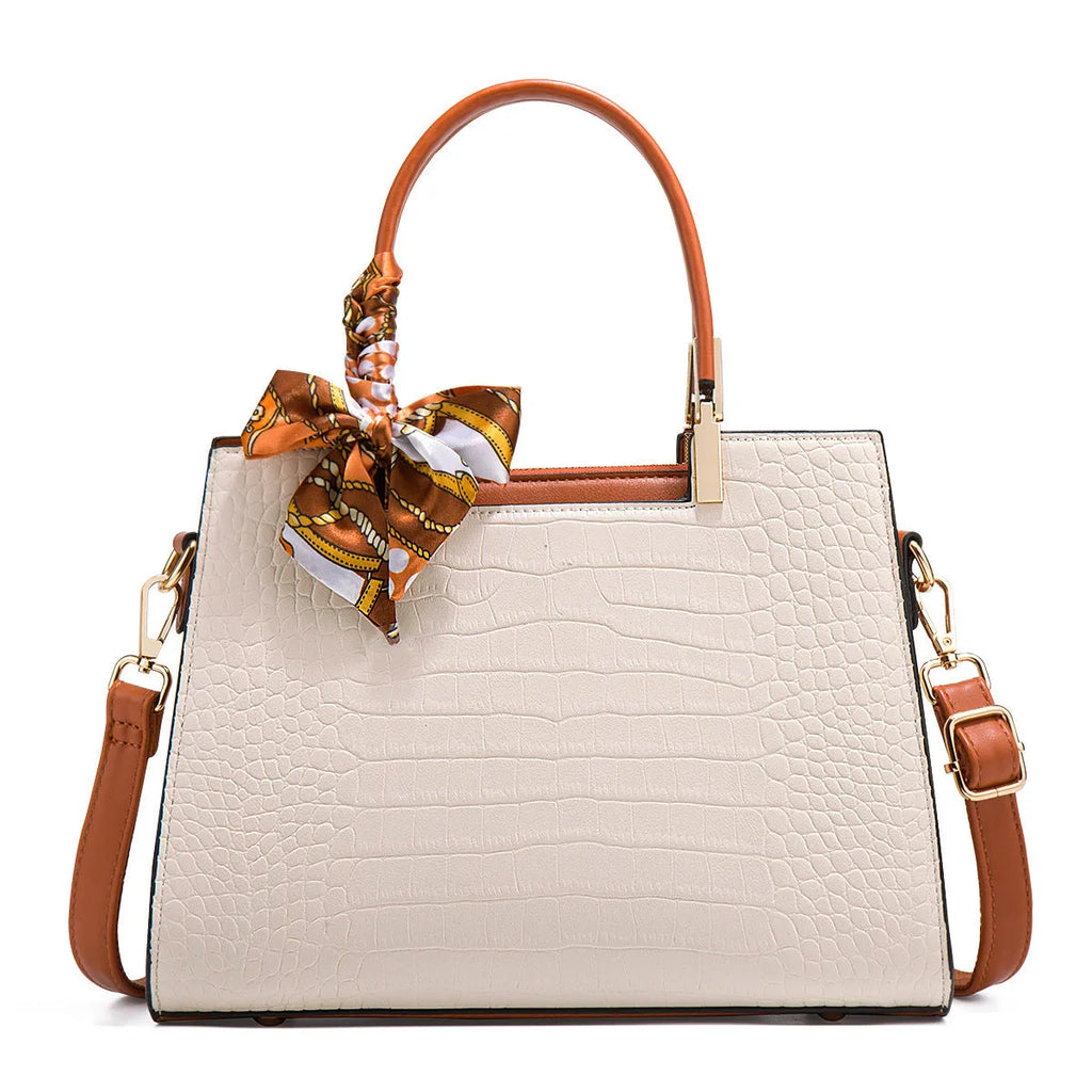Milky white women's large square shoulder handbag made of PU with visible stitching and an external slit pocket.