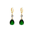 A pair of green geometric teardrop-shaped alloy earrings on a white background.
