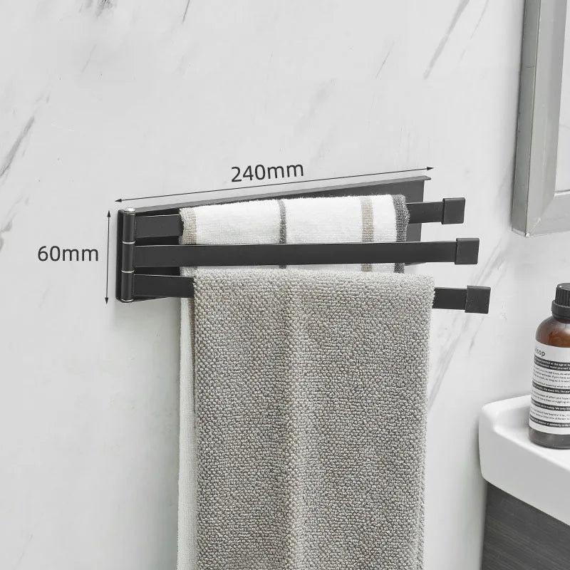 Nordic-style folding towel rack in black or white with adhesive mounting system