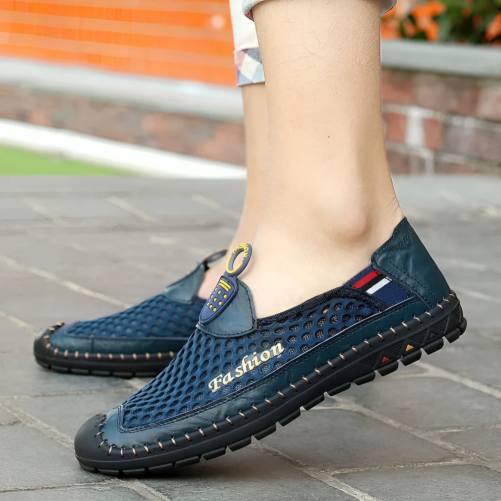 Men's brown casual mesh shoes with round toe, stitching detail, and a rubber sole.