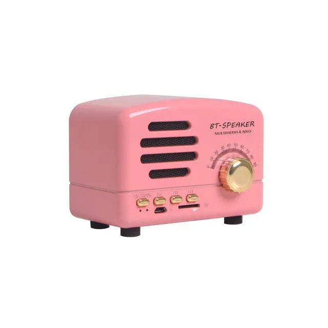 Vintage wood Bluetooth speaker in pink, black, and wood grain colours showing compact 93x70x59mm dimensions