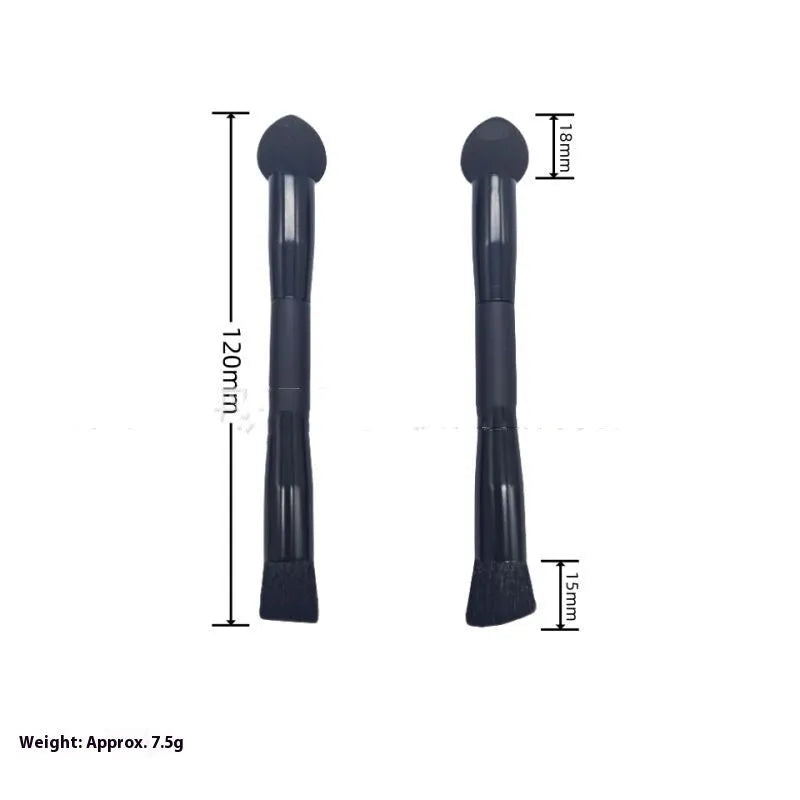 Black dual-ended concealer brush with a wooden handle and a pointed sponge applicator tip for under-eye makeup.