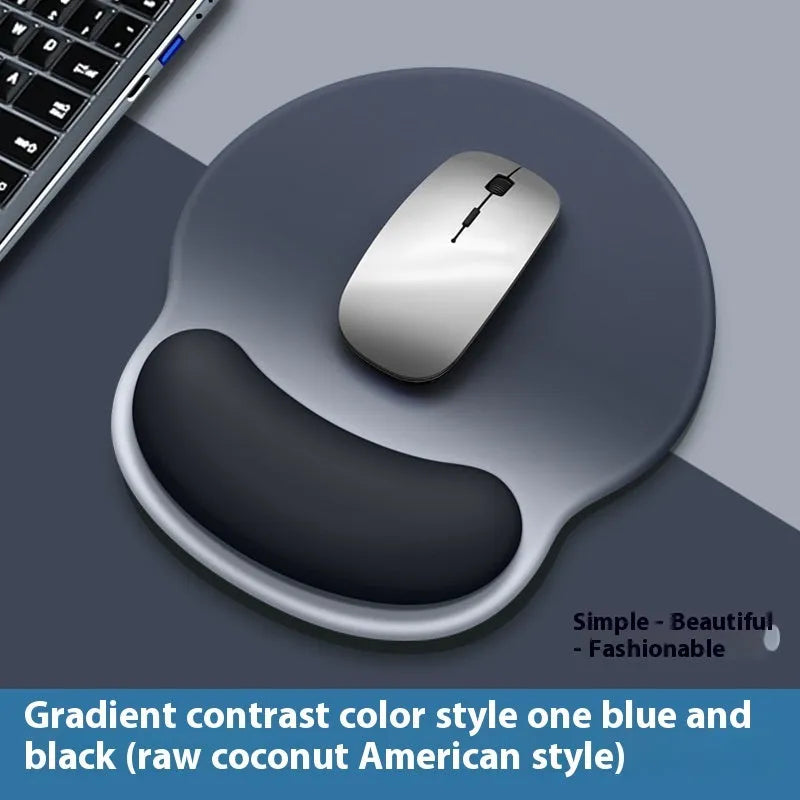 Silicone mouse mat with wrist rest in gradient colour pattern on desk