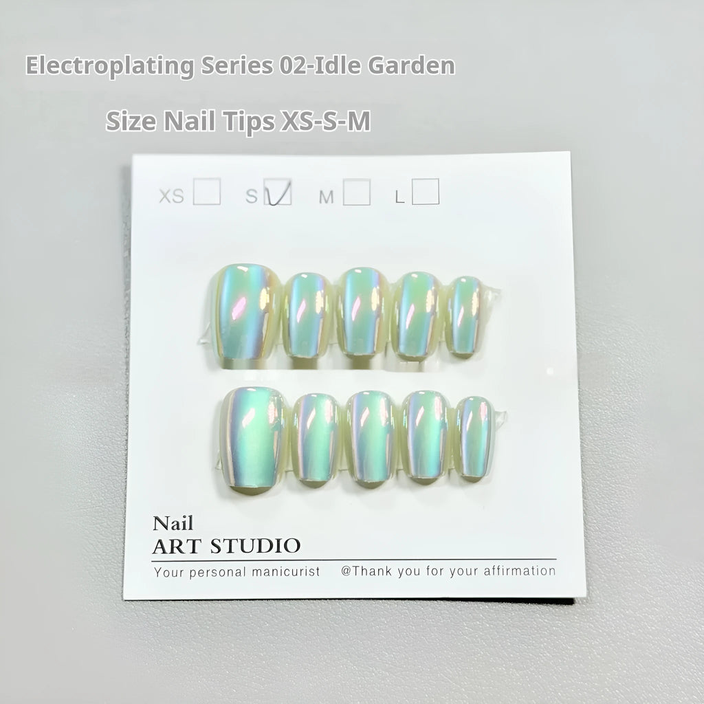 Electroplated Cat's Eye press-on nails with Aurora armour finish in short ladder XS, S, and M sizes