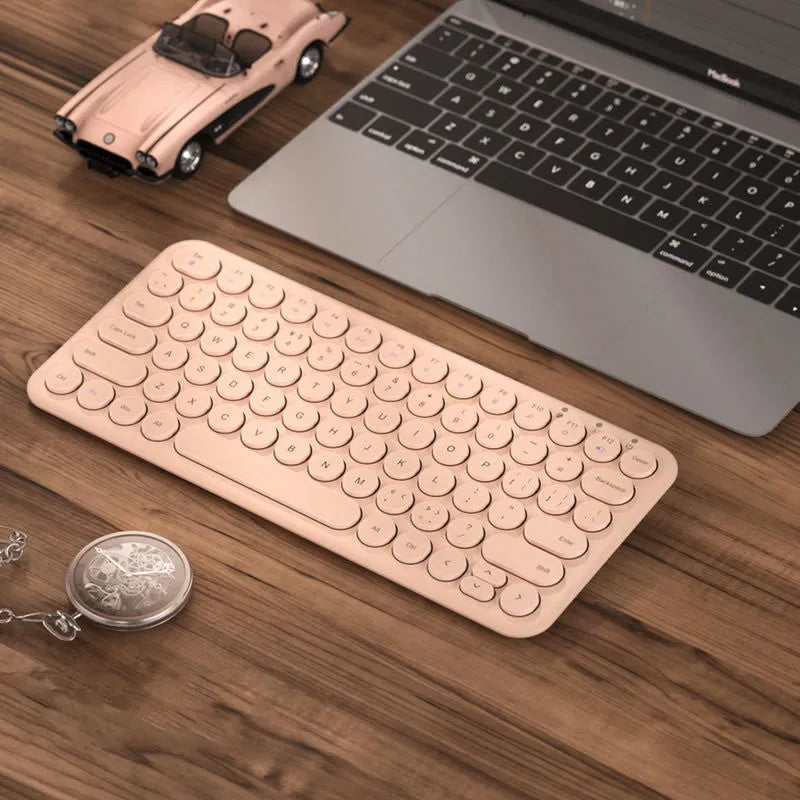 White ultra-thin wireless keyboard and mouse set with USB receiver and keyboard film on desk
