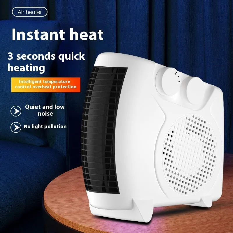 Small white ceramic desktop electric heater with control dial, shown on a wooden desk.