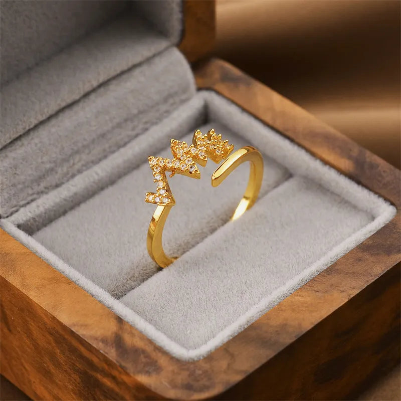 Gold geometric open adjustable women's ring showing Korean fashion design with electroplated finish
