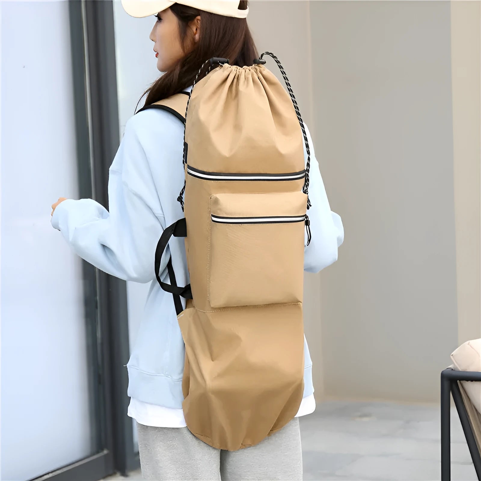Waterproof nylon skateboard backpack in camouflage, showing large capacity for fishing rods and sports gear.