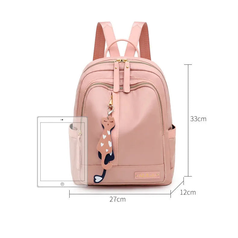 Women's black nylon casual backpack with multiple compartments and double shoulder straps