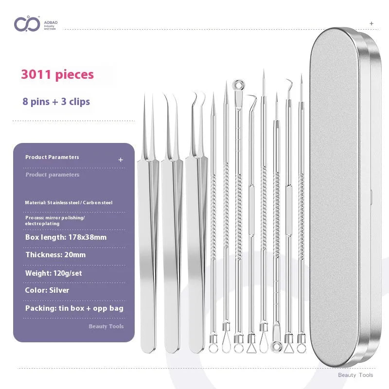 Four silver metal acne needles with pointed tips laid out on a flat surface.