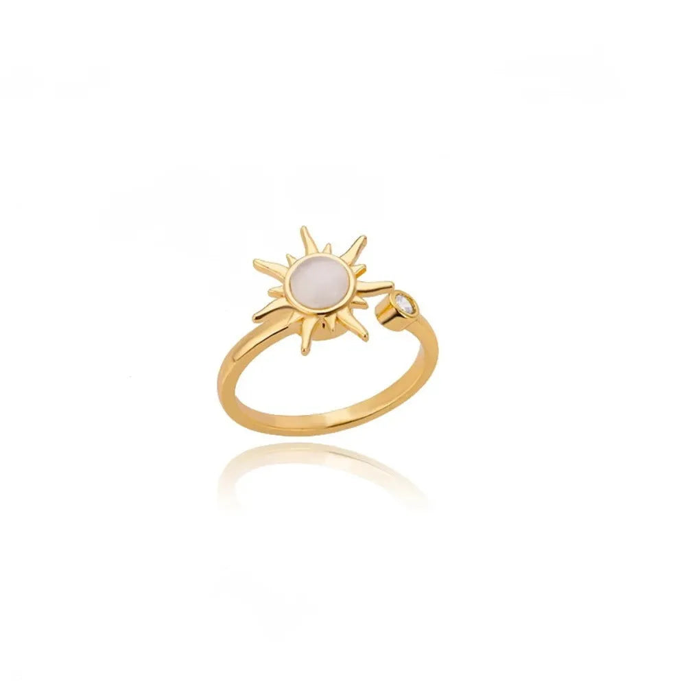 Simple geometric copper decompression ring with adjustable opening in gold colour.